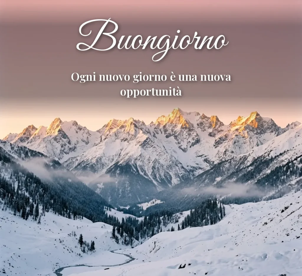 Alba sulle montagne innevate con frase positiva